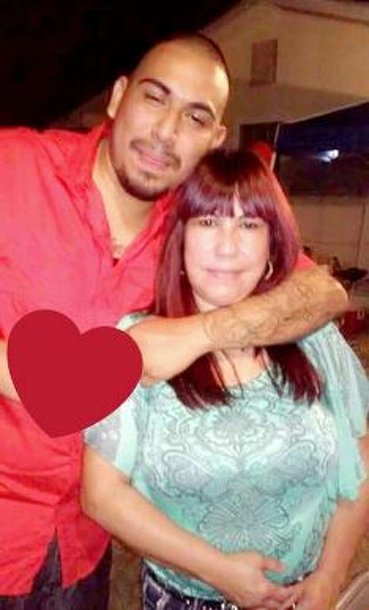 Edwin Mendoza and his mother Rosa Mendoza are shown in this photo.