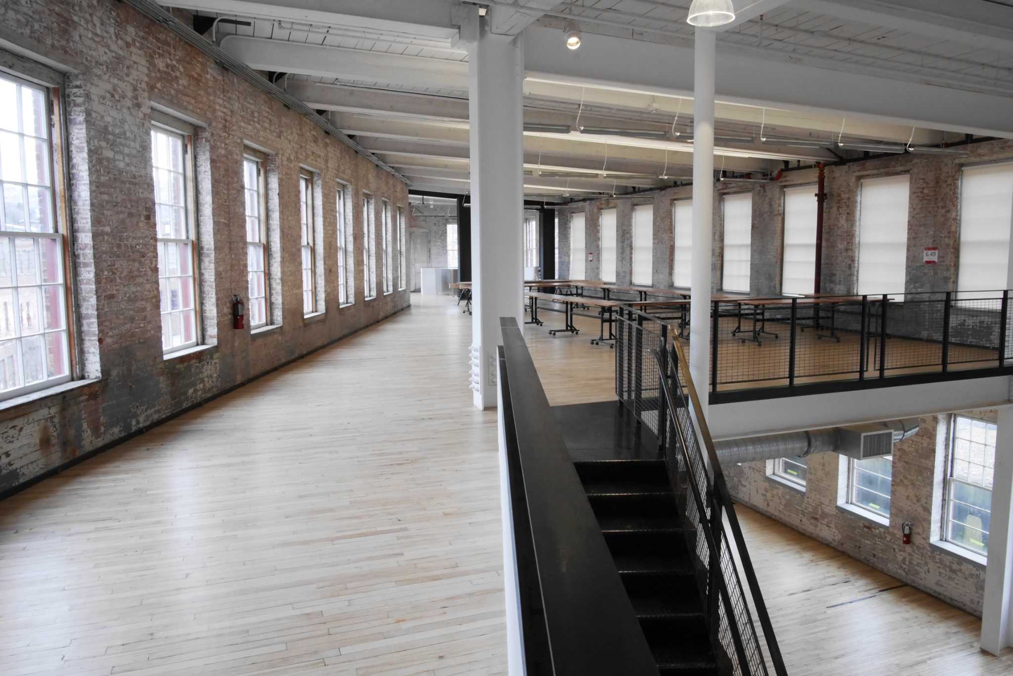 MASS MoCA - Standing in the lightwell of MASS MoCA's new Building 6,  opening Memorial Day Weekend. A big concert caps the big opening when CAKE  takes the stage. Tickets to the