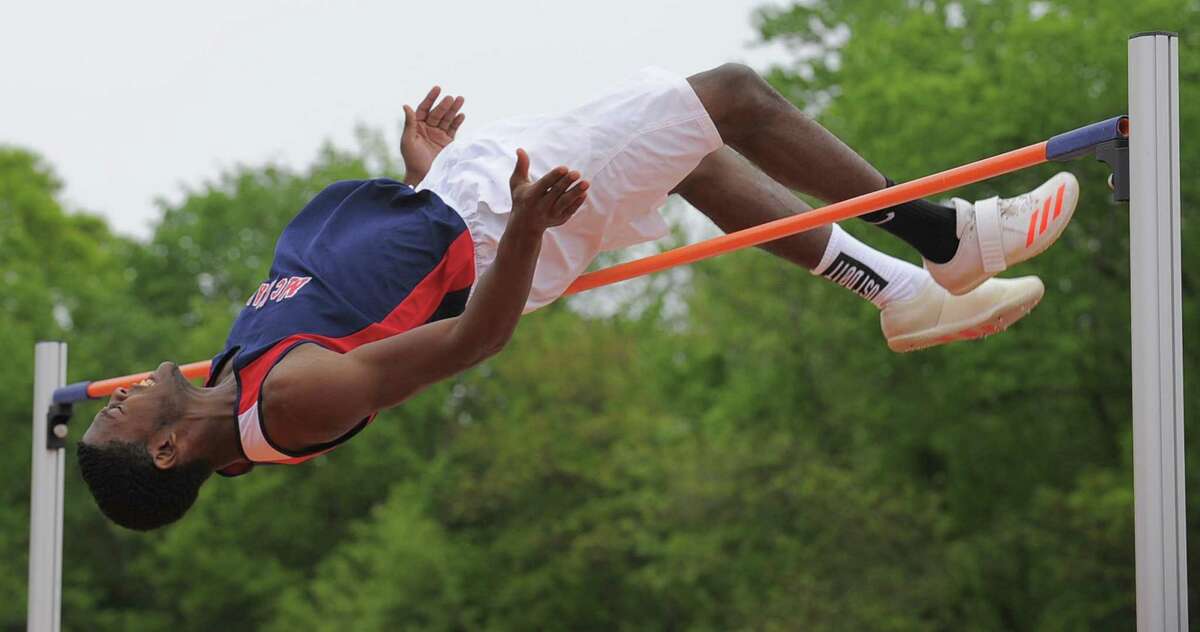 McMahon’s Justin Forde clears 6-06.00 to take second place in the boys high jump Tuesday.