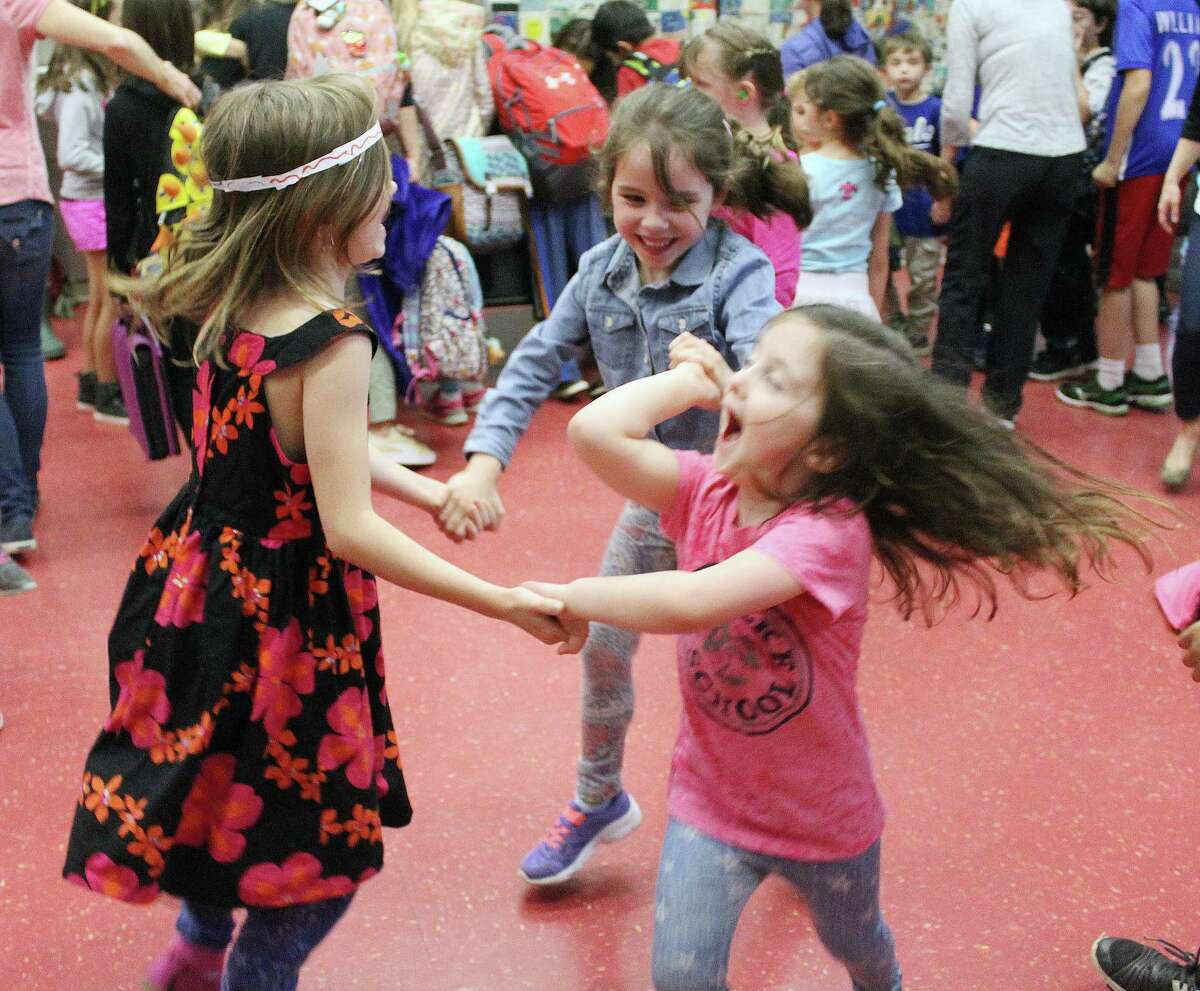 Tokeneke Elementary School students raise over 3,000 for sister school