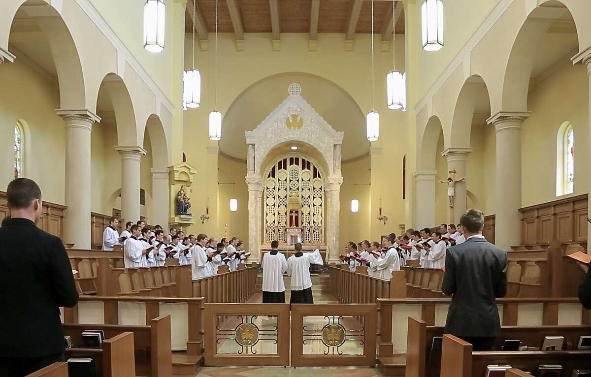 In this May 12, 2017 photo, members of the Priestly Fraternity of Saint Peter, a Catholic order formed in 1988, perform a Gregorian chants at Our Lady of Guadaloup seminary in Denton, Neb. The seminarians released an album, "Requiem," on May 12, singing a traditional Latin funeral Mass. (AP Photo/Nati Harnik)