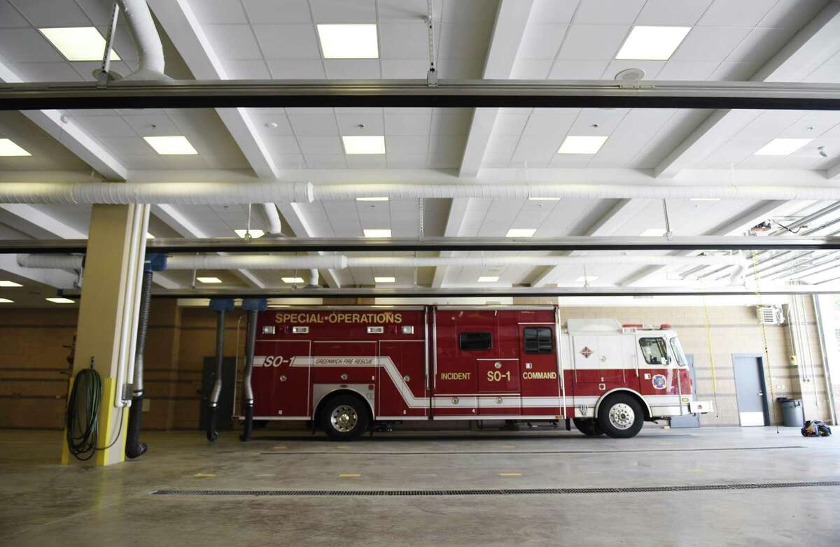 A fire engine sits inside the main bay at the Central Fire Station after its official opening in Greenwich, Conn. Wednesday, May 24, 2017. The $17.1 million firehouse officially opened Wednesday following a ribbon-cutting ceremony. The fire station, which houses a ladder truck, engine company and administrative offices, connects to the police station to form the Public Safety Complex.
