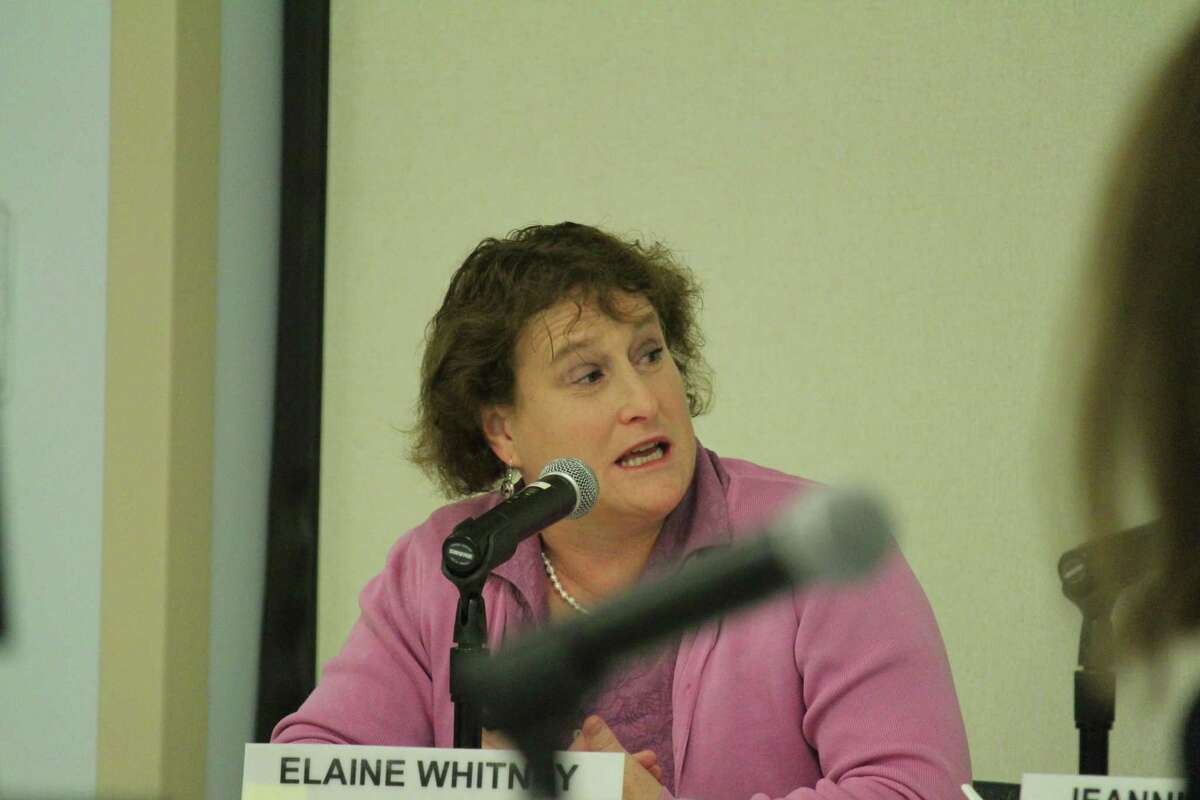 Board of Education member Elaine Whitney asks a question at the school board meeting Monday.
