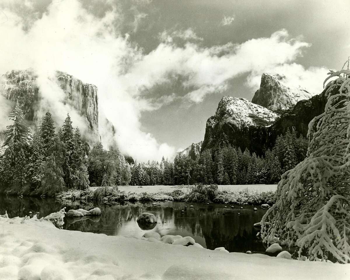 Trailing mists of snowstorm swirl over Yosemite Valley. Photo courtesy of Unite States Department of the Interior National Park Service. October 1, 1990