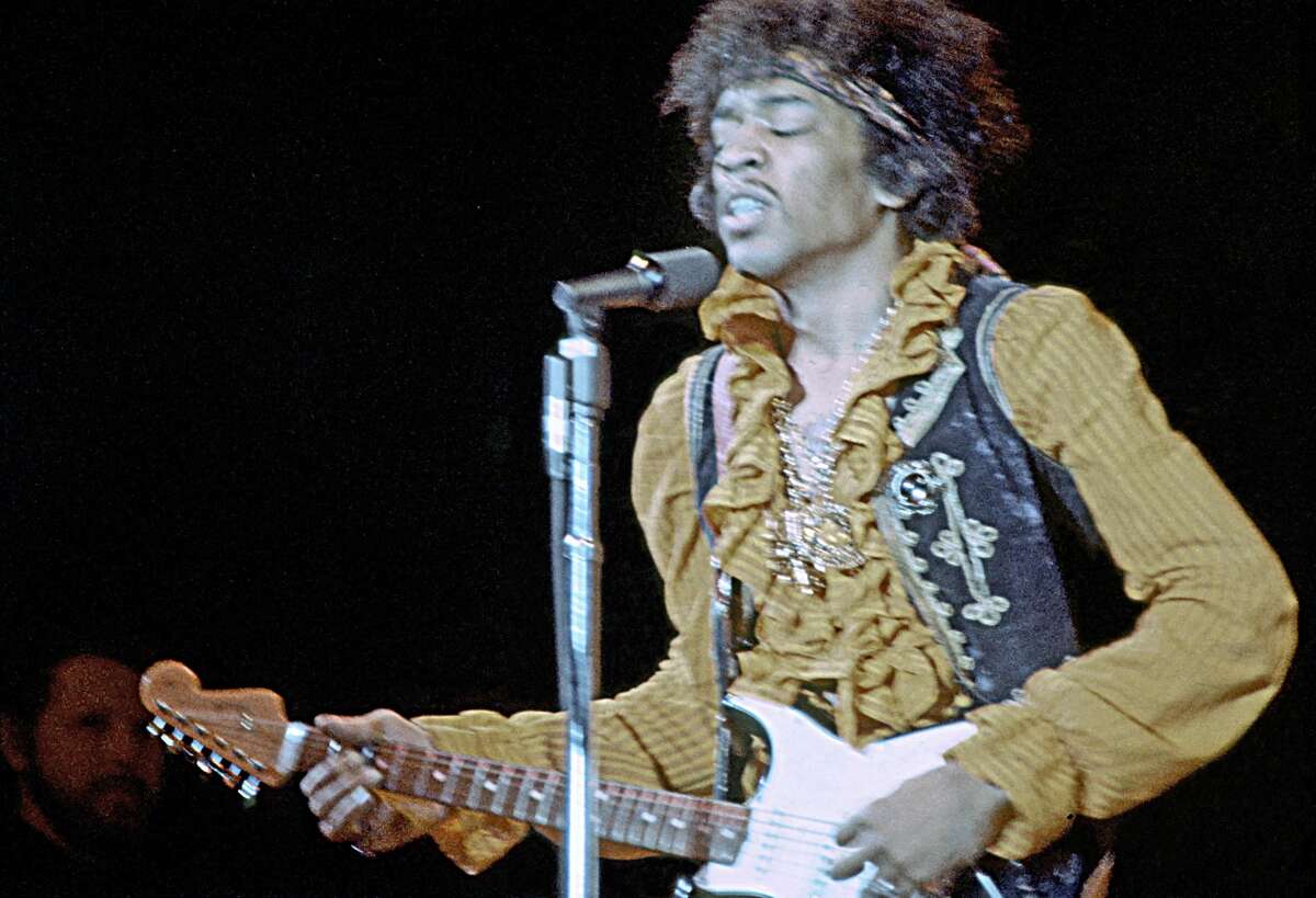 The following images are archival photos from the 1967 Monterey International Pop Festival.  Jimi Hendrix performs onstage at the Monterey International Pop Festival on June 18, 1967.