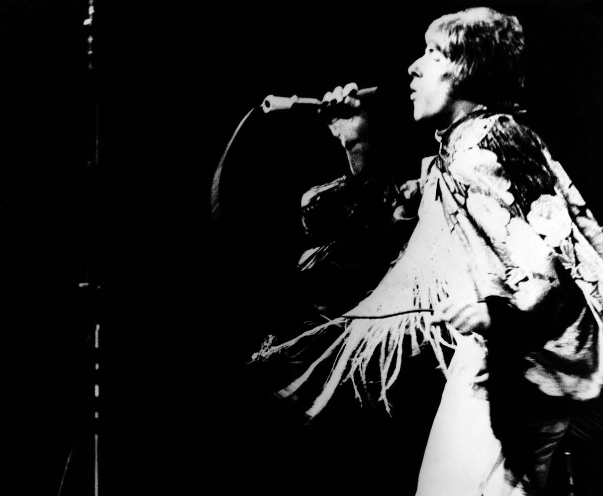 Photo of Roger Daltrey performing on stage at the 1967 Monterey International Pop Festival.