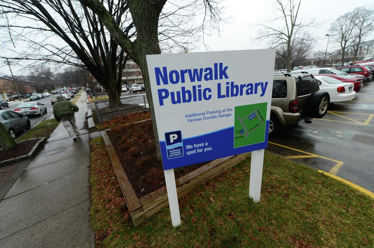 The unused parking lot next to the Norwalk Public Library Main Branch on Mott Avenue Tuesday, January 17, 2017, in Norwalk, Conn. There is an ongoing appeal of the Norwalk Zoning Commission?’s 2016 approval of a 60-unit apartment complex for the lot that had been available for library visitors.