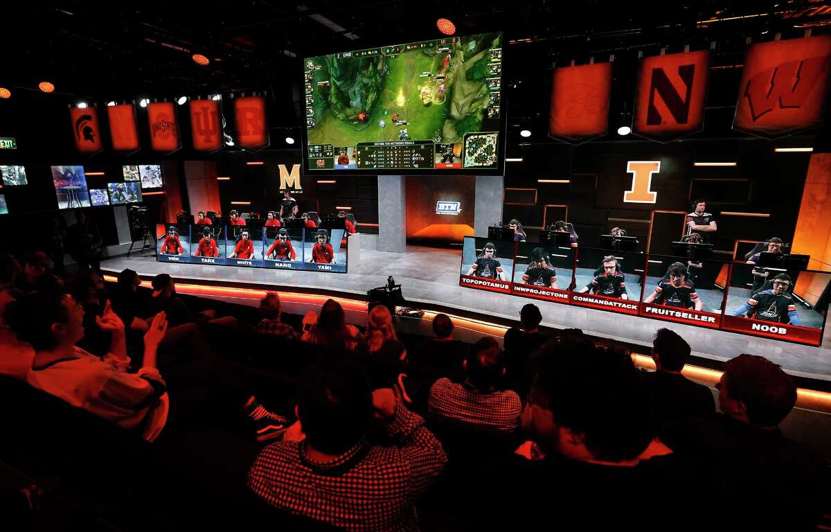 The audience watches a match between the University of Maryland, left, and the University of Illinois in the Big Ten Network "League of Legends" championship in the Battle Theater at North American League Championship Arena at Riot Games on March 28 in Los Angeles. Maryland won the best-of-five contest 3-0.