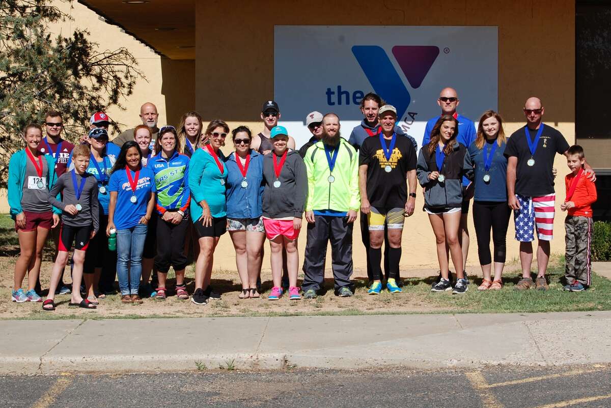 A number of competitors were age-group winners at the Plainview YMCA's Armed Forces Day Triathlon Saturday. Not pictured are Regan Manning, Daniel Schantin and Rick Shaw.