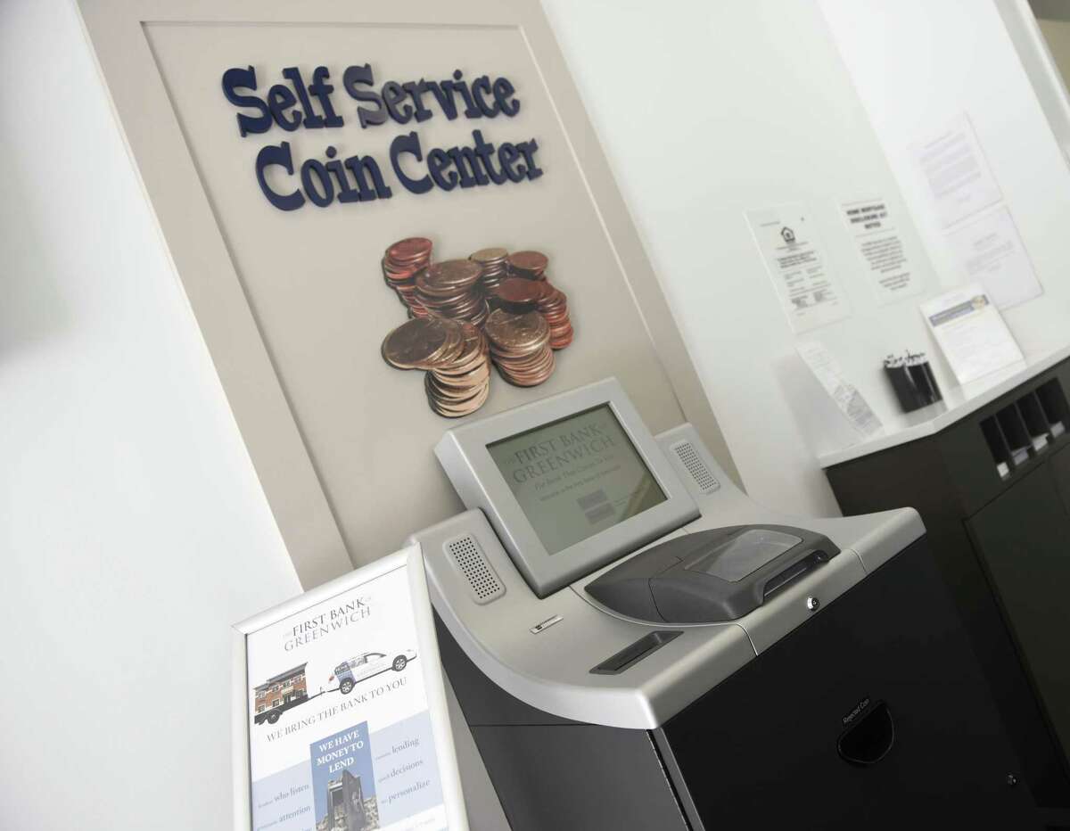 A self-service coin center at a First Bank of Greenwich branch in Stamford, Conn.