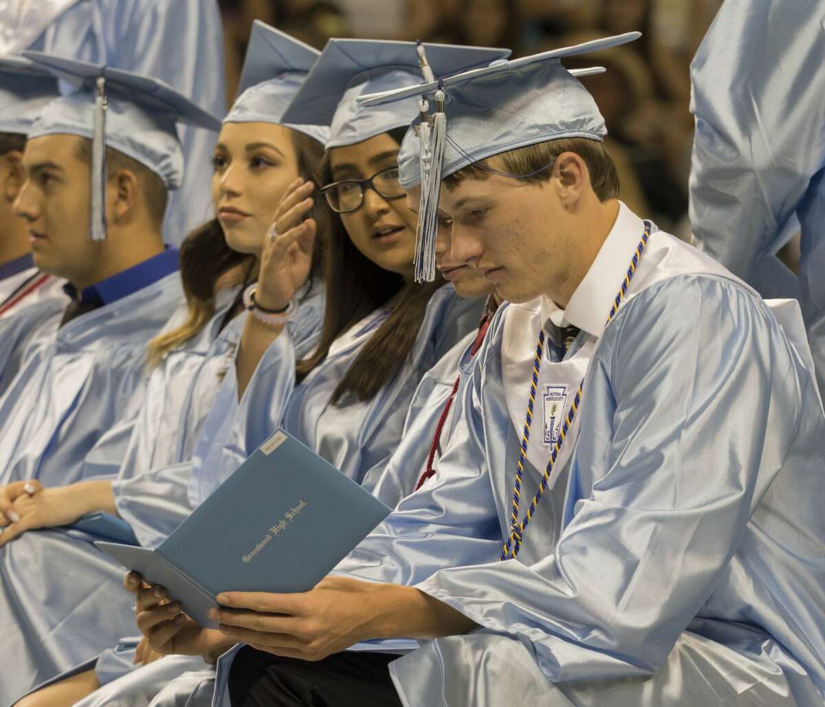 Greenwood graduates walk the stage to get their diplomas 5/25/17 at the Chaparral Center. Tim Fischer/Reporter-Telegram