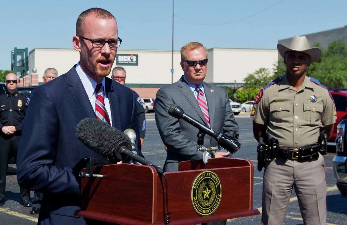 Montgomery County Special Crimes Bureau Chief Tyler Dunman, left, speaks alongside Sheriff Rand Henderson and Texas Department of Public Safety Trooper Erik Burse during a press conference addressing increased DWI enforcement for the Memorial Day weekend at The Woodlands Mall, Thursday, May 25, 2017, in The Woodlands.