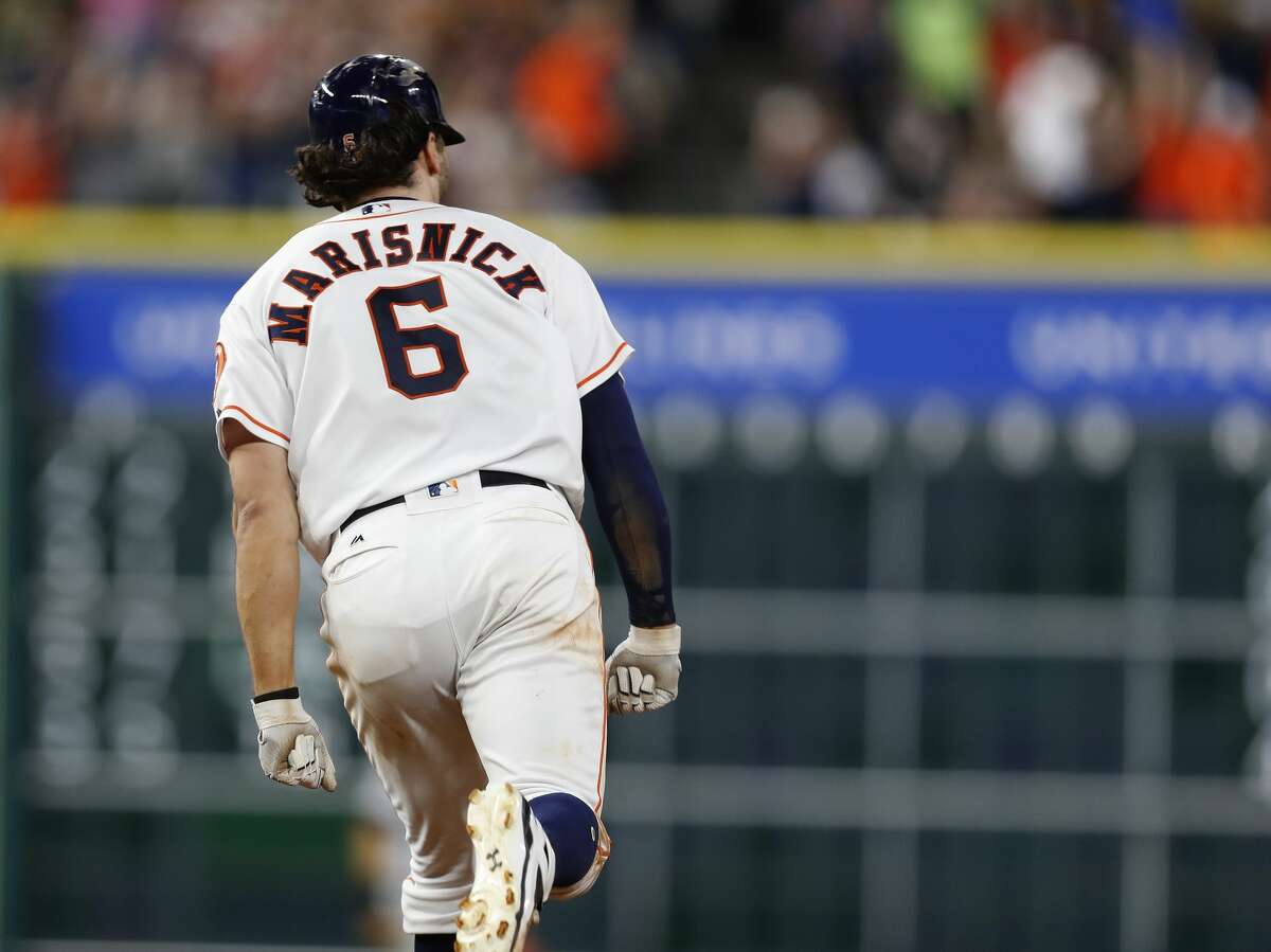 Houston Astros center fielder Jake Marisnick (6) celebrates his game winning home run during the eighth inning of an MLB baseball game at Minute Maid Park, Thursday, May 25, 2017. ( Karen Warren / Houston Chronicle )