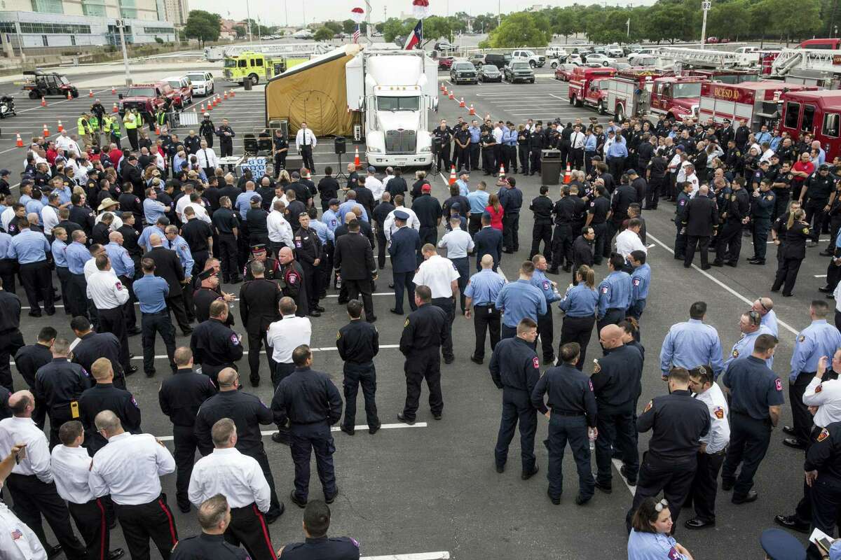 More than five hundred gathered for an apparatus procession led by the San Antonio Fire Department for fallen firefighter Scott Deem in San Antonio, Texas on May 26, 2017. Ray Whitehouse / for the San Antonio Express-News