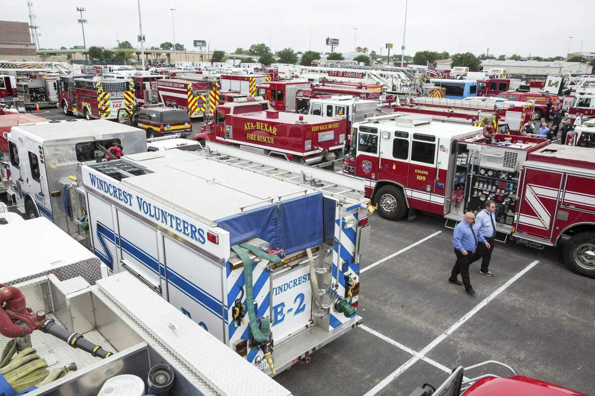 More than 125 fire trucks gathered for an apparatus procession led by the San Antonio Fire Department for fallen firefighter Scott Deem in San Antonio, Texas on May 26, 2017. Ray Whitehouse / for the San Antonio Express-News