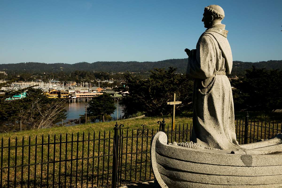 St. Junipero Serra statue in the Lower Presidio Historic Park overlooks the Fisherman's Wharf in Monterey, Calif. Thursday, May 18, 2017.