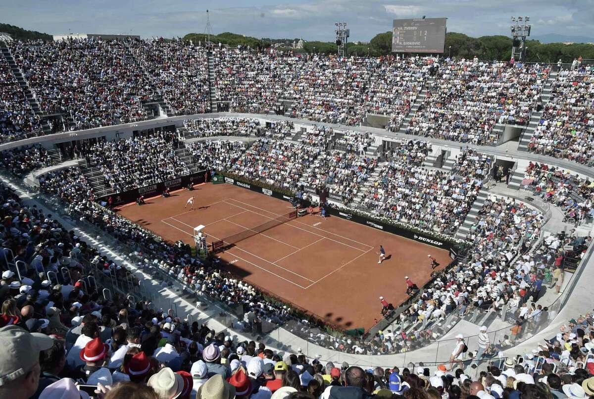 Alexander Zverev of Germany serves against Novak Djokovic of Serbia during the ATP Tennis Open final, on May 21, 2017 at the Foro Italico in Rome. Germany's Alexander Zverev stunned four-time Rome champion Novak Djokovic 6-4, 6-3 to win his first Masters title on Sunday, confirming his status as a French Open dangerman. / AFP PHOTO / TIZIANA FABITIZIANA FABI/AFP/Getty Images