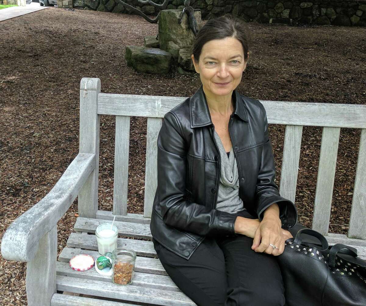 Nathalie Nicolai, originally from Lyon, France, enjoys lunch outside at Greenwich Commons when the weather is fine. She works at Alliance Francaise, as a French teacher, and at the Greenwich Library.