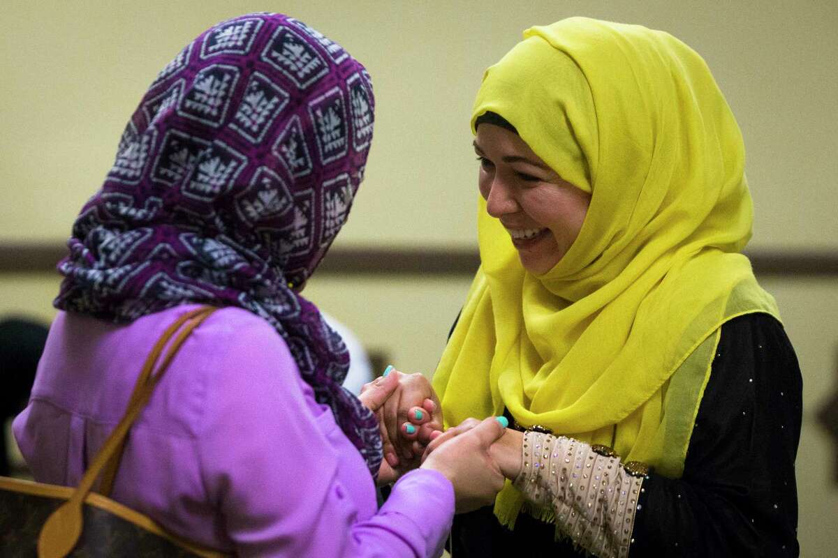 Monica Morales, right, shares a moment with a sister in faith after the call for prayer at the Centro Islamico in Houston, Friday, May 19, 2017. The islamic center for Spanish speakers opened its doors in January 2016. ( Marie D. De Jesus / Houston Chronicle )