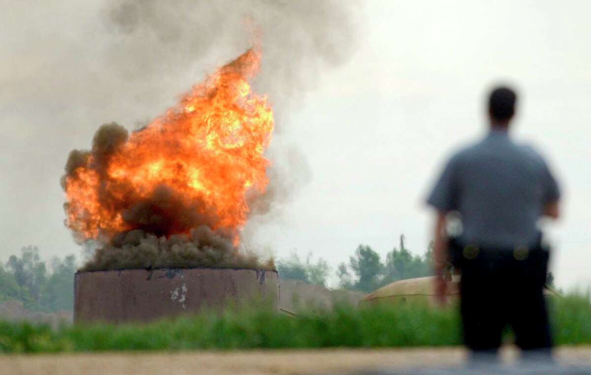 An oil tank burns on Thursday after a tank battery owned by Anadarko Petroleum Corp. exploded in Weld County, Colo. One worker died in the blast, and three others suffered burns.