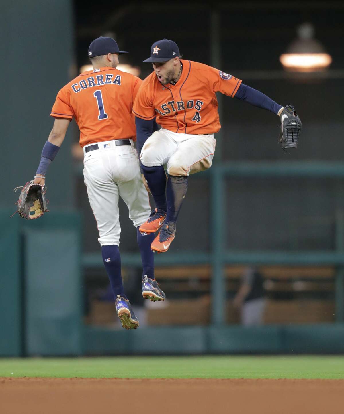 Houston Astros Carlos Correa (1) and George Springer (4) celebrate the Astros 2-0 win over Baltimore Orioles at Minute Maid Park on Friday, May 26, 2017, in Houston. ( Elizabeth Conley / Houston Chronicle )