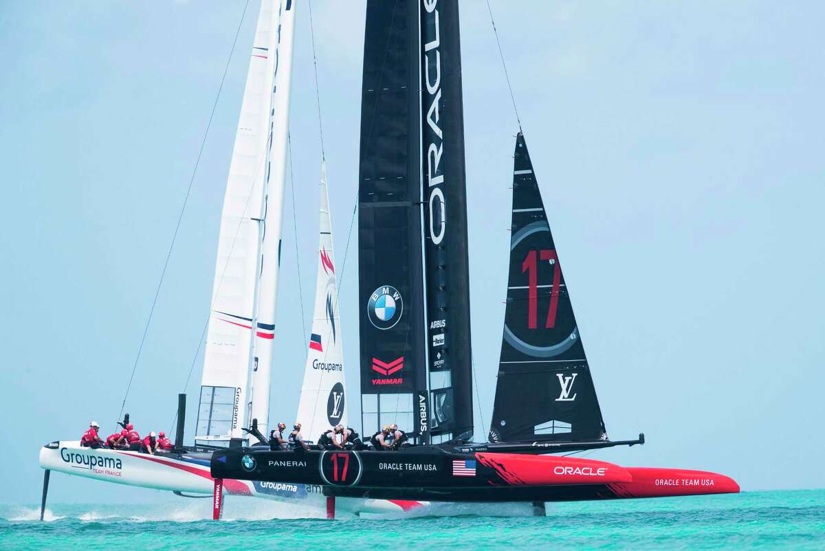 Groupama Team France, left, ﻿races Oracle Team USA as the 35th America's Cup gets going Saturday on Bermuda's Great Sound. Team USA won and then beat Emirates Team New Zealand later in the day.