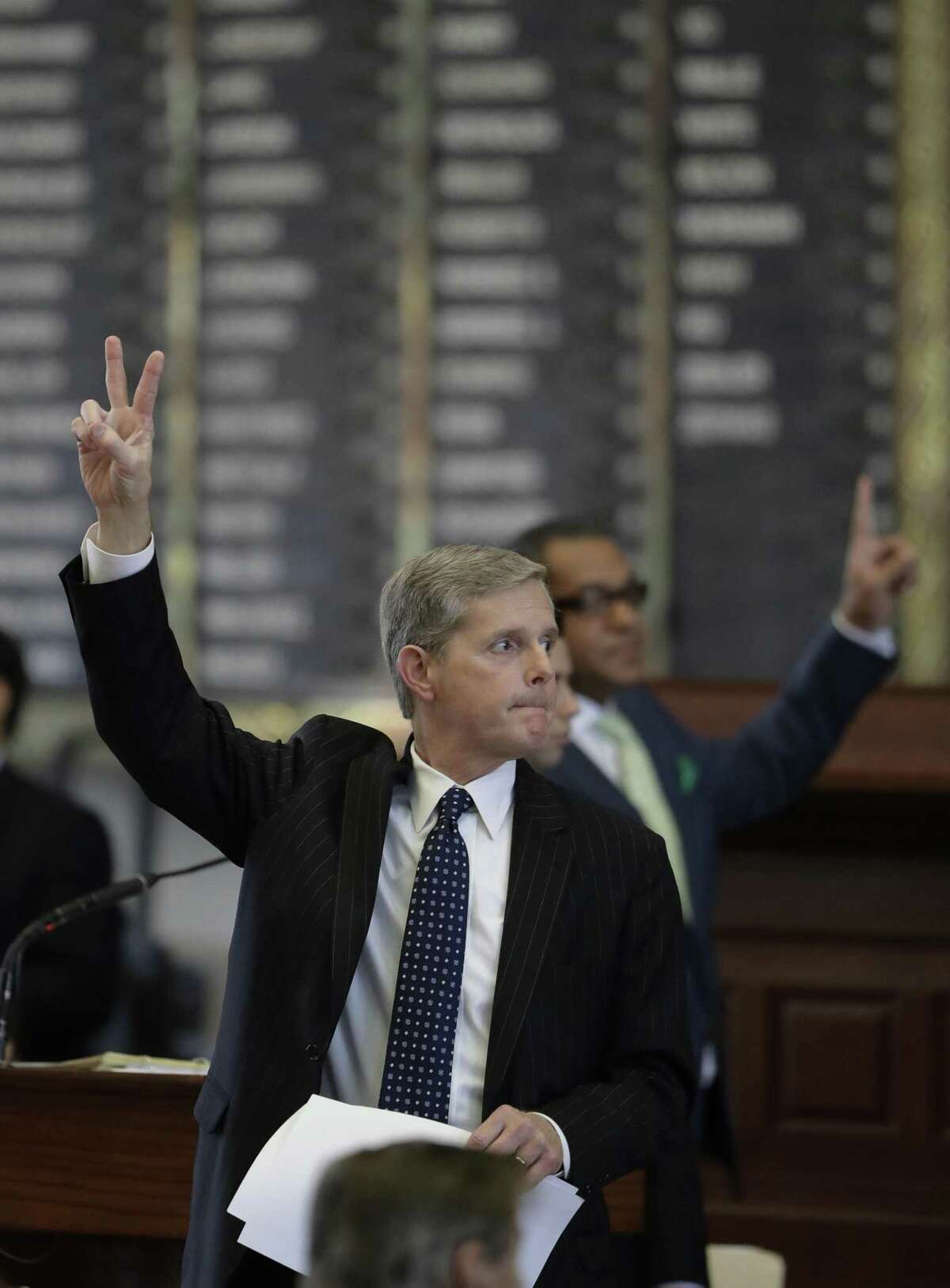 Texas Rep. Phil King, R-Weatherford, votes against an amendment to SB5, a weakened version of the state's voter ID law that a federal judge called discriminatory, Tuesday, May 23, 2017, in Austin. (AP Photo/Eric Gay)
