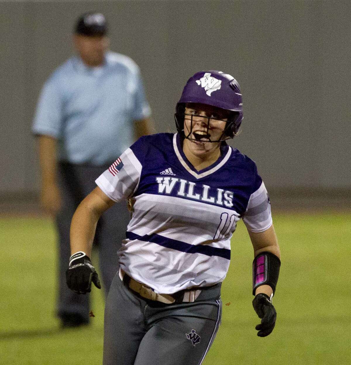 Rachel Brown #11 of Willis celebrates after her walk-off, two-run homer during the ninth inning in Game 3 of a Region III-5A final high school softball series at Cougar Softball Stadium, Saturday, May 27, 2017, in Houston. Wilis defeated Barbers Hill 5-3.