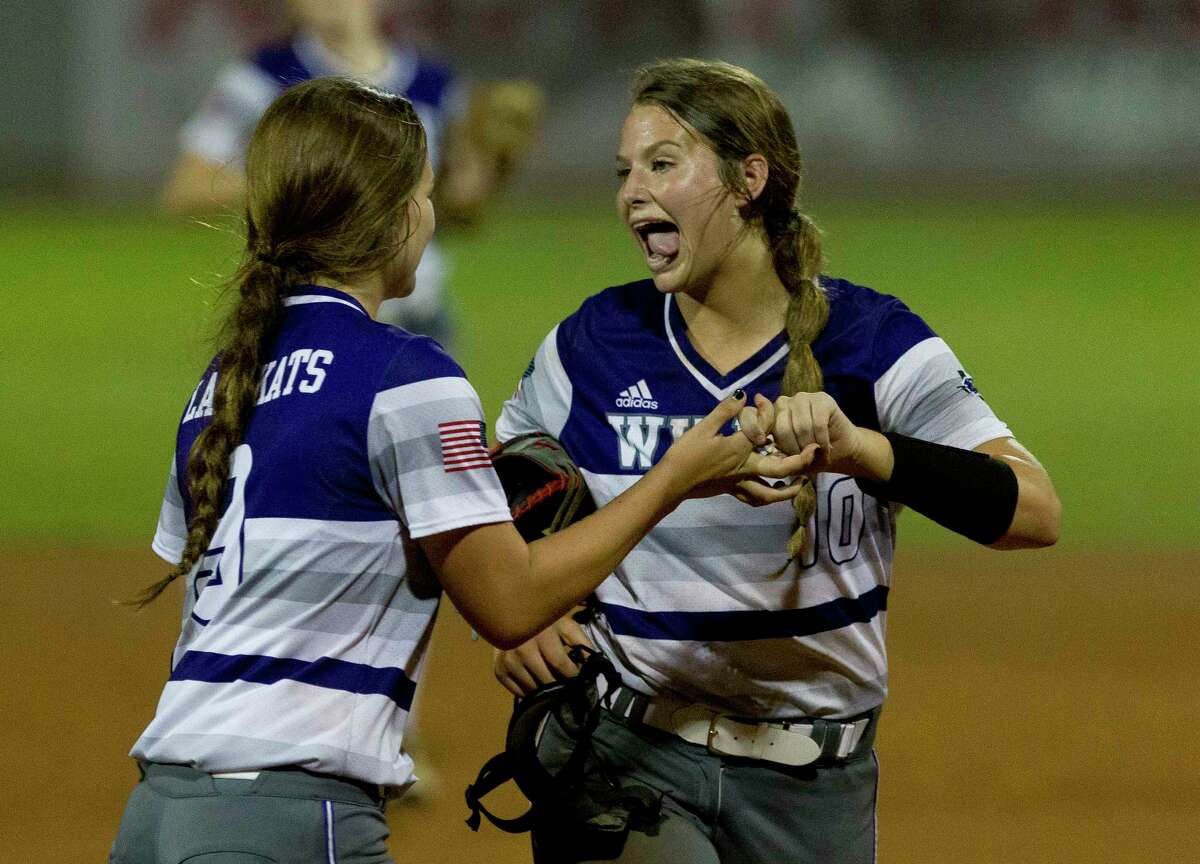 Willis starting pitcher Casey Dixon (10) makes a face at shortstop McKenzie Parker (9) after striking out Autumn Dawson #9 of Barbers Hill during the fifth inning in Game 3 of a Region III-5A final high school softball series at Cougar Softball Stadium, Saturday, May 27, 2017, in Houston.