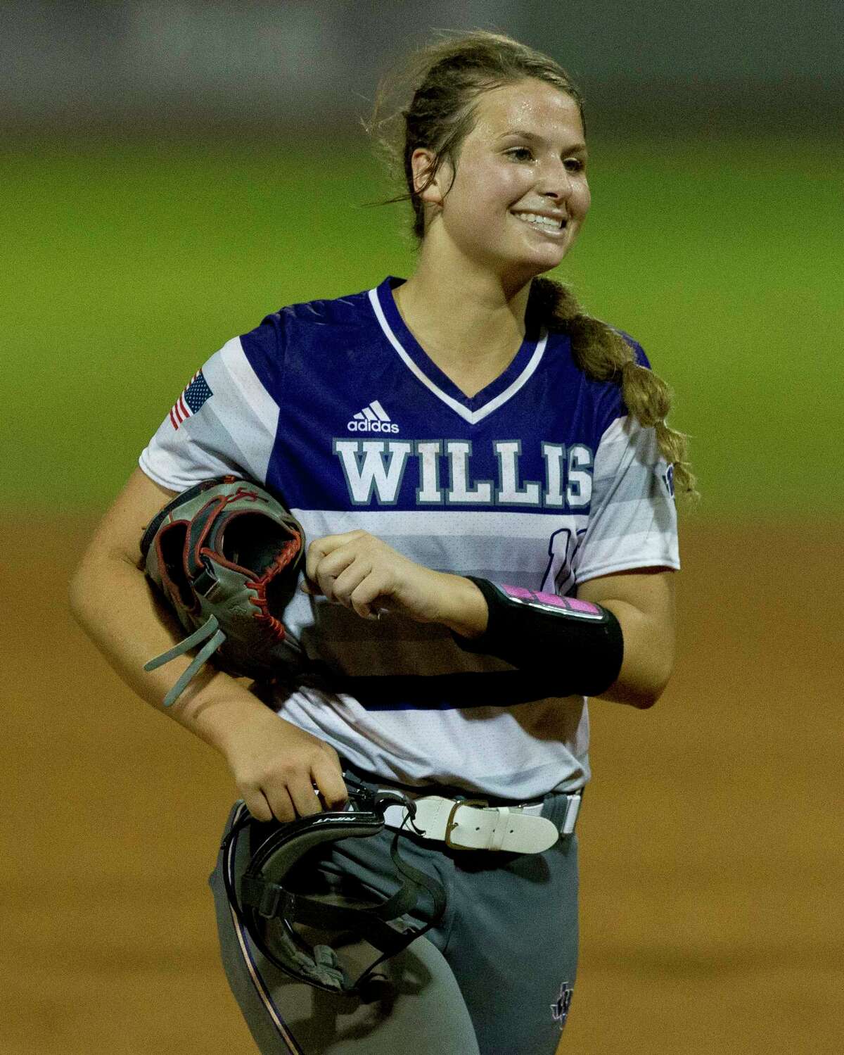 Willis starting pitcher Casey Dixon (10) smiles after striking out Autumn Dawson #9 of Barbers Hill to end the top of the fifth inning in Game 3 of a Region III-5A final high school softball series at Cougar Softball Stadium, Saturday, May 27, 2017, in Houston.