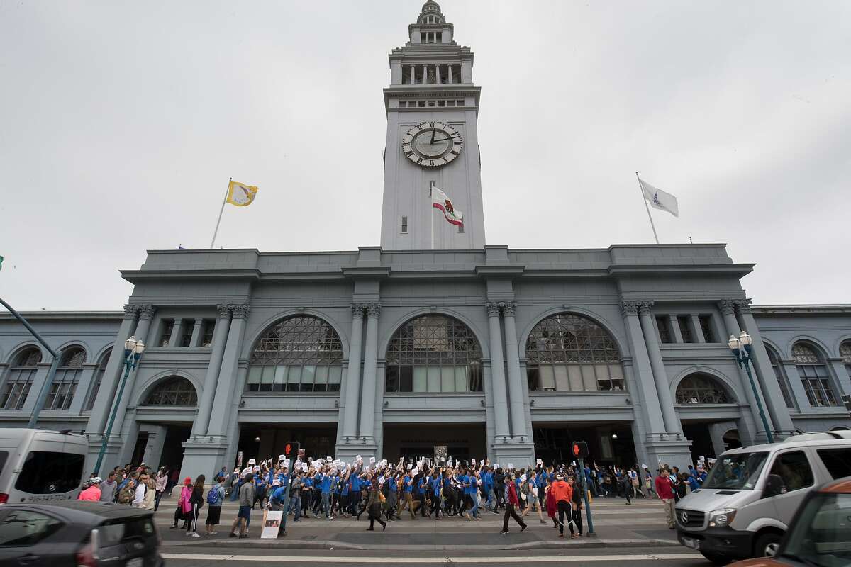 About 350 people of Direct Action Everywhere (DxE) demonstrated at the at the Ferry Building and marched to Pier 39 on The Embarcadero on Sunday, May 28 2017 in San Francisco, CA