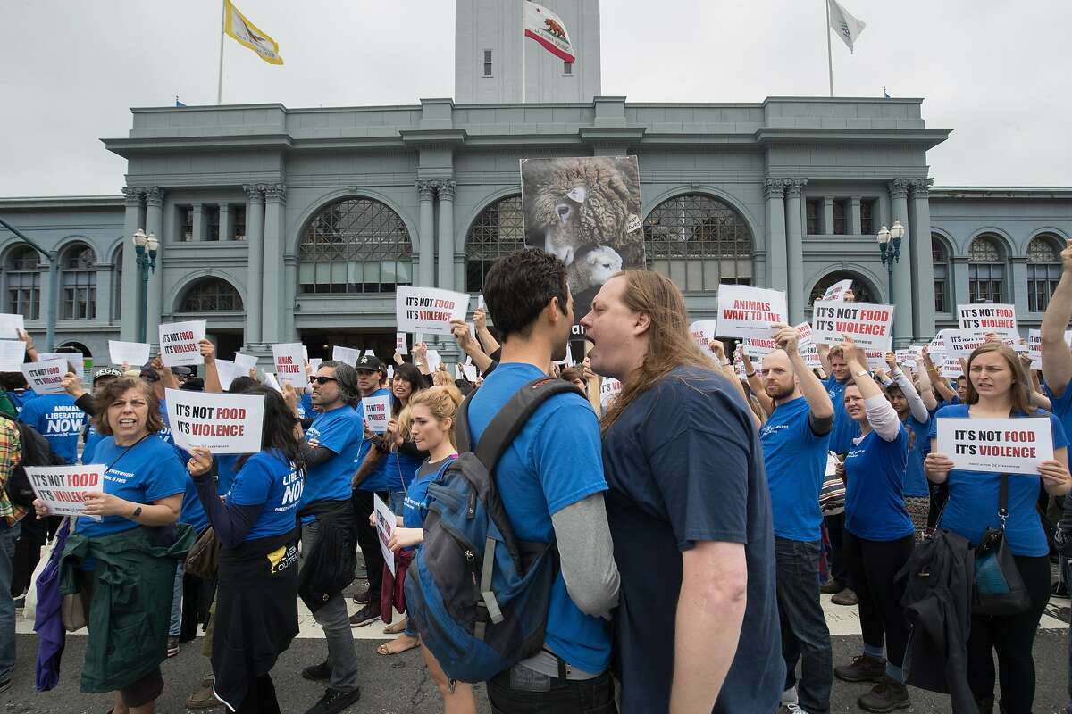 In this file photo, about 350 people of Direct Action Everywhere (DxE) demonstrate at the at the Ferry Building before a march to Pier 39 on The Embarcadero on Sunday, May 28 2017 in San Francisco, CA.