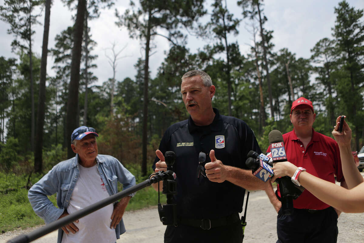 Captain Jimmy Williams, spokesman for the New Waverly Fire Department, informs the press that Ezra, 3-year-old missing in Sam Houston National Forest has been rescued and transported to the hospital in The Woodlands, Sunday, May 28, 2017, in Waverly. ( Marie D. De Jesus / Houston Chronicle )