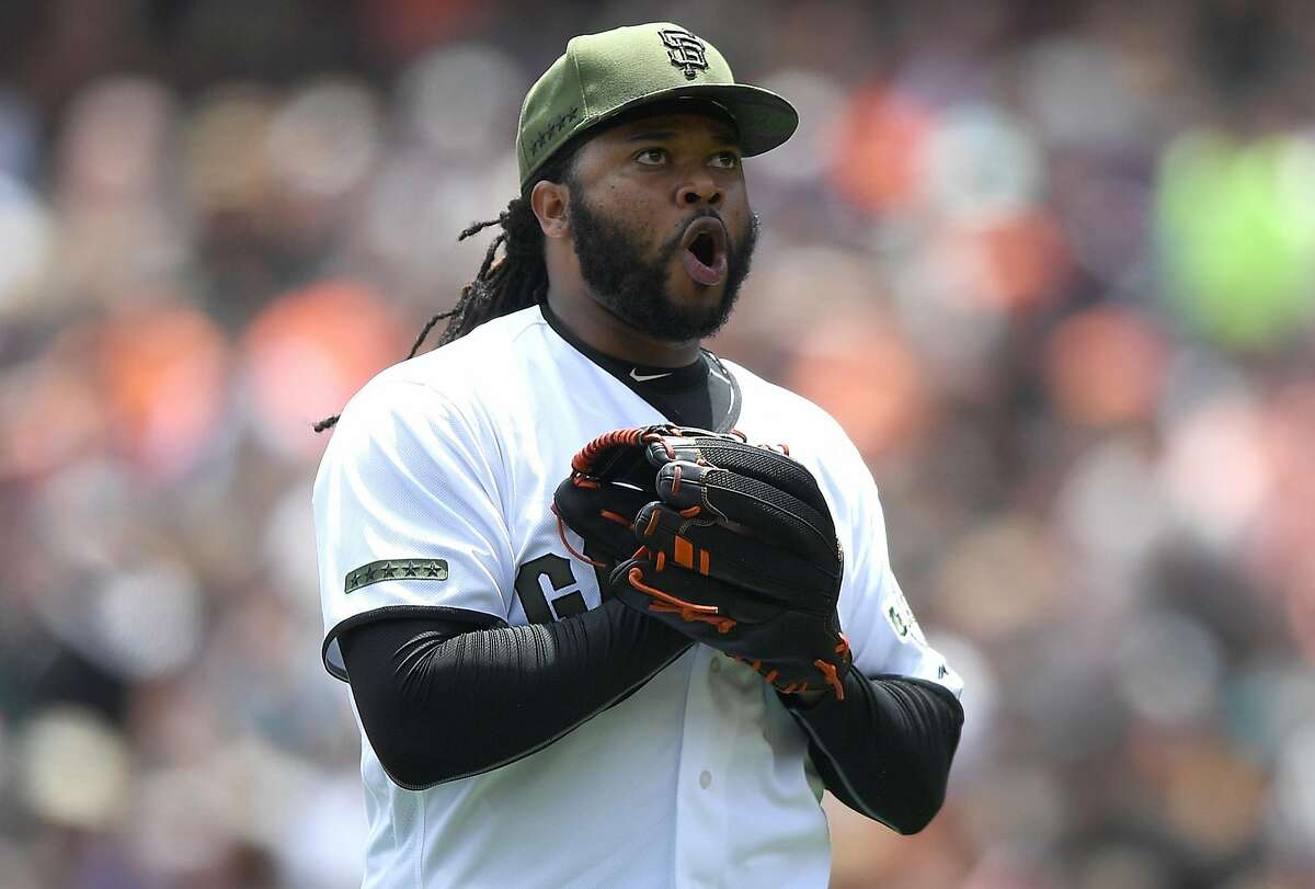 SAN FRANCISCO, CA - MAY 28: Johnny Cueto #47 of the San Francisco Giants reacts after striking out Matt Adams #18 of the Atlanta Braves for the third out of the top of the first inning at AT&T Park on May 28, 2017 in San Francisco, California. (Photo by Thearon W. Henderson/Getty Images)