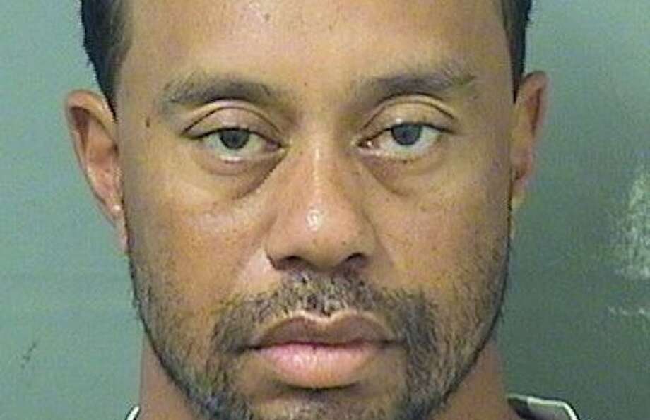Espn Is Being Accused Of Altering Tiger Woods Mugshot To Make His
