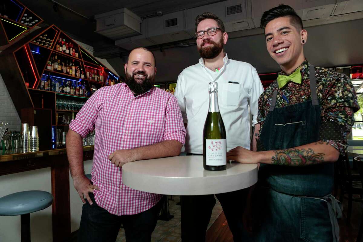 Better Luck Tomorrow's Justin Vann, center, flanked by Terry Williams, left, and Alex Negranza, touts Clotilde Davenne Brut Extra Crémant De Bourgogne.