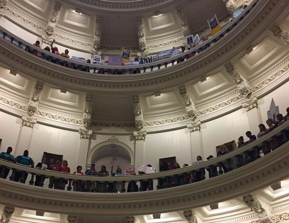 Protesters gather in the Texas Capitol on Monday, May 29, 2017 to protest the "sanctuary cities" law.