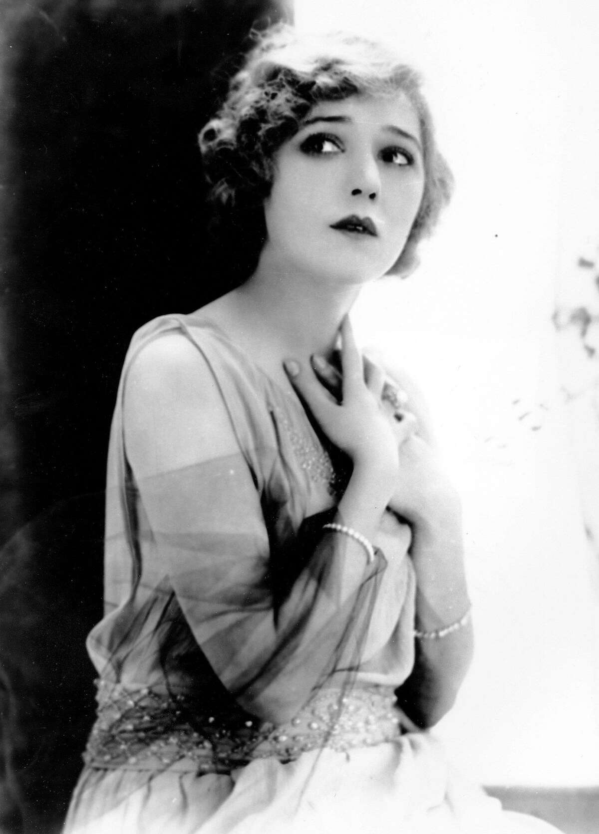 ** FILE ** Canadian-born American actress Mary Pickford is photographed on Aug. 29, 1922. Mary Pickford, nicknamed America's Sweetheart or simply ``Little Mary.'' She was perhaps the best known woman in the world. (AP Photo) Ran on: 07-11-2004 Canadian-born actress Mary Pickford, known as Americas Sweetheart, embodies the era in this 1922 photo.