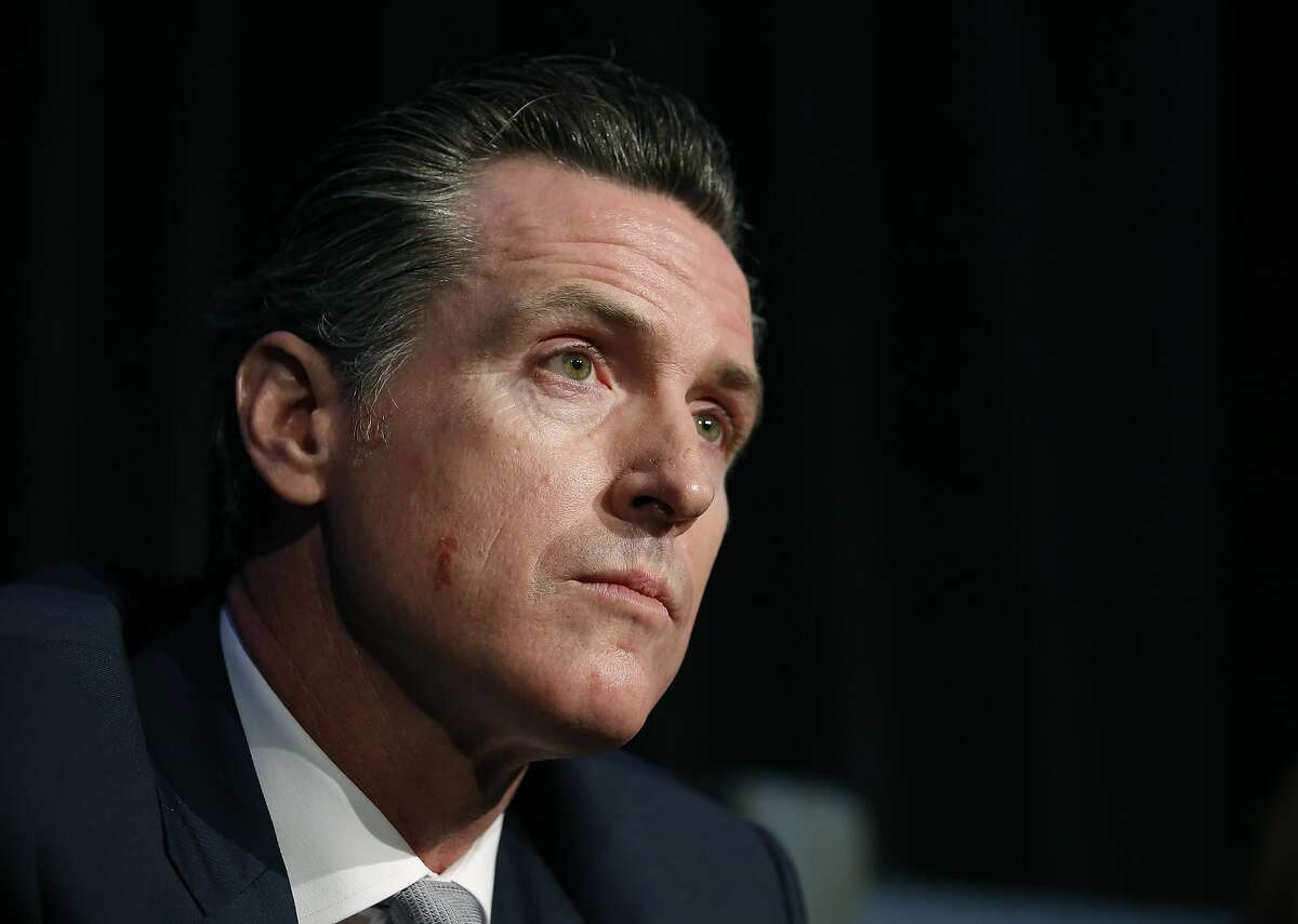 Lt. Gov. Gavin Newsom, a candidate for California governor, listens to a question during a gubernatorial candidates forum, Tuesday, April 4, 2017, in Sacramento, Calif. Newsom along with fellow Democratic gubernatorial candidates, state Treasurer John Chiang and former Los Angeles Mayor Antonio Villaraigosa addressed attendees at a conference held by Crime Survivors For Safety and Justice. (AP Photo/Rich Pedroncelli)
