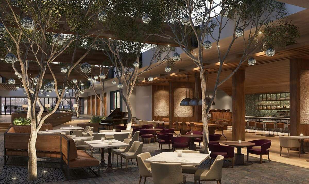 Portola Hotel & Spa�s transformed lobby features the new Jacks Monterey bar and restaurant, which includes atrium seating among live trees.