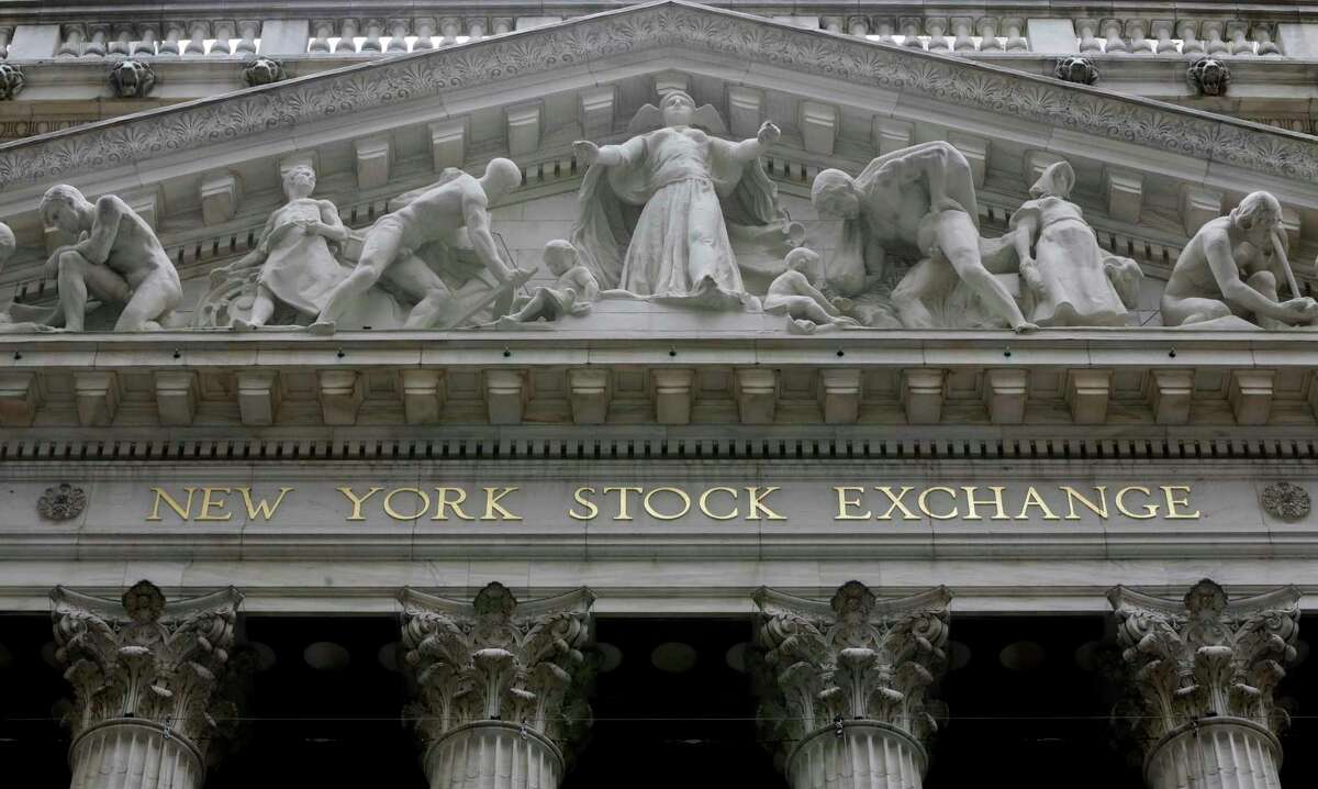 FILE - This Thursday, Oct. 2, 2014, file photo, shows the facade of the New York Stock Exchange. U.S. stocks are lower early Tuesday, May 30, 2017, as energy companies once again slump with the price of oil and banks slide in tandem with bond yields and interest rates. (AP Photo/Richard Drew, File)