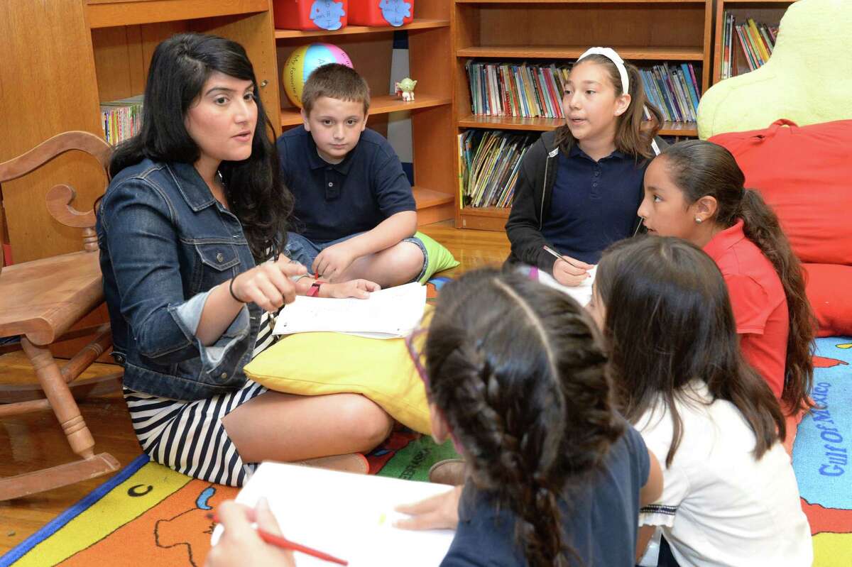 3rd grade reading and language arts teacher Mary Sayegh leads a class at Field Elementary School on April 26, 2017.