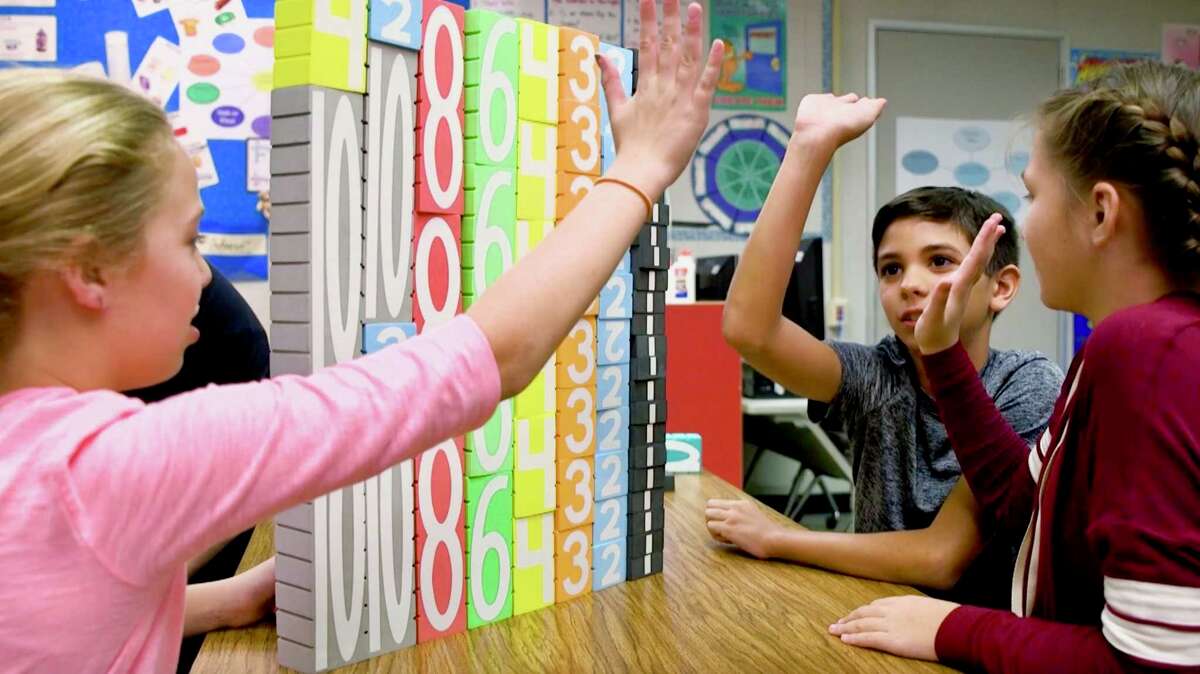 Learning on the go. Elementary staffs. Whiteboard Elementary School students