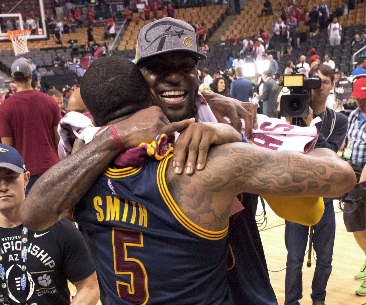 FILE - In this May 27, 2016, file photo, Cleveland Cavaliers forward LeBron James celebrates the team's win over the Toronto Raptors with J.R. Smith after Game 6 of the NBA basketball Eastern Conference finals, in Toronto. This was the sixth time (fifth straight) LeBron James advanced to the NBA Finals. (Frank Gunn/The Canadian Press via AP, File)