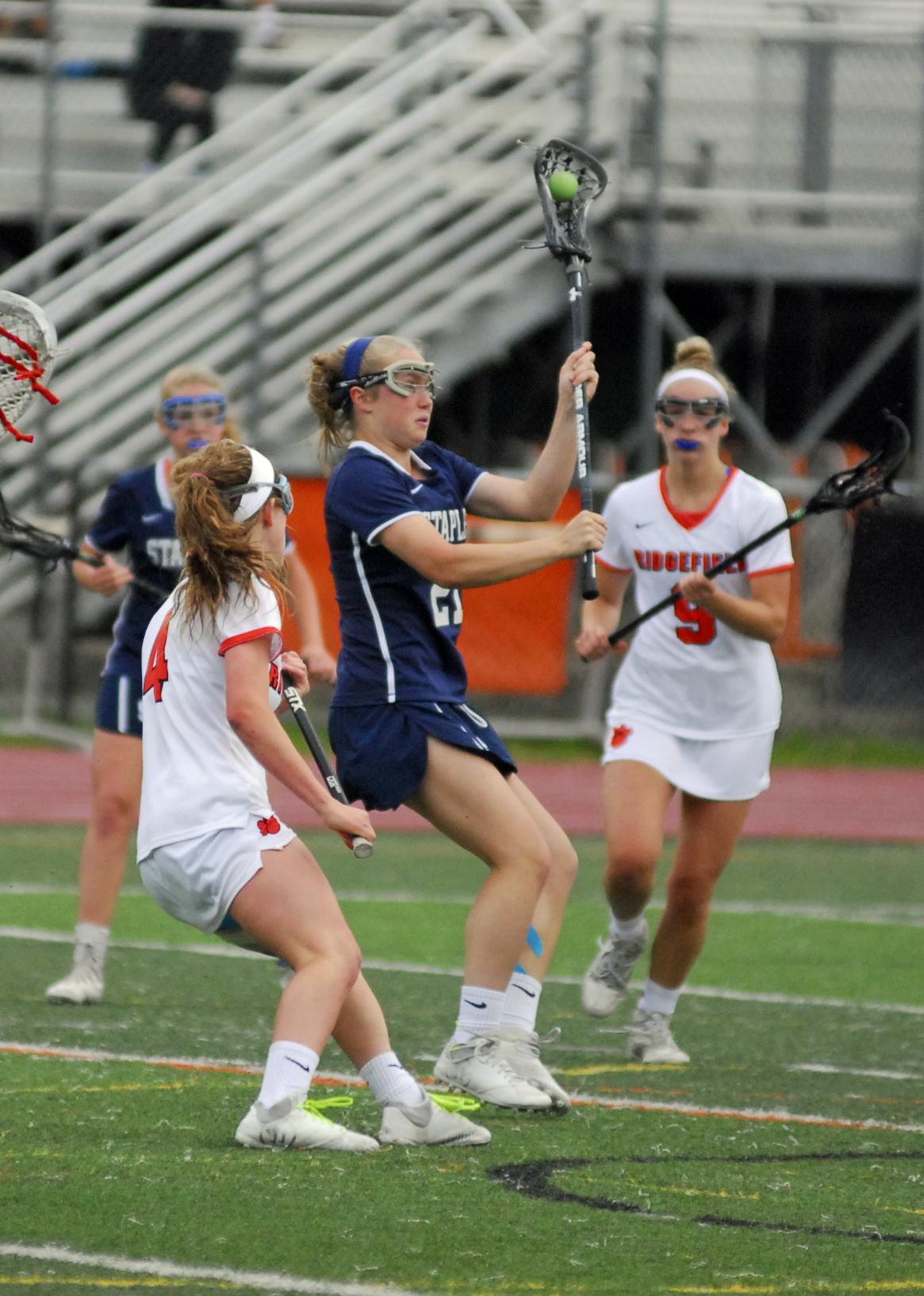 Girls lacrosse: Staples edges Ridgefield in Class L first round