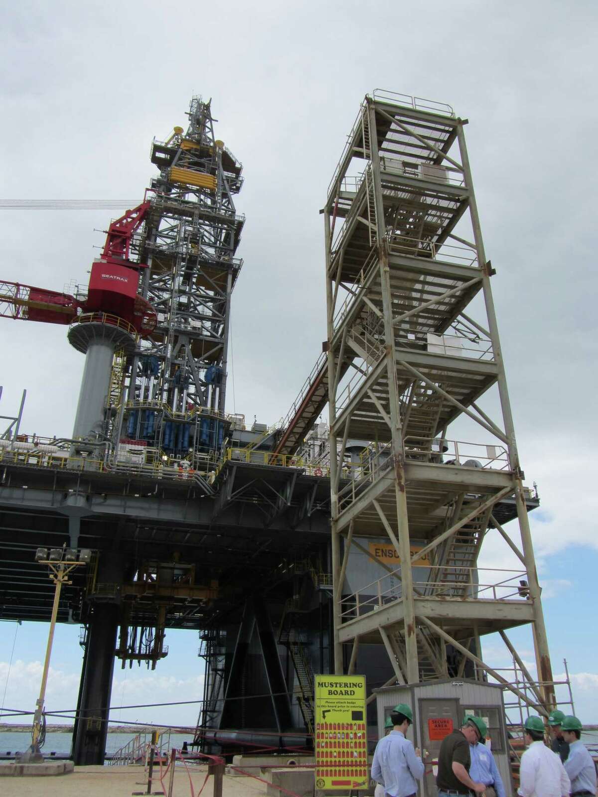 The main deck of the ENSCO 8505 is 97 feet high; the derrick is another 201 feet. The main deck tower Is more than six stories above the dock level. April 11, 2012
