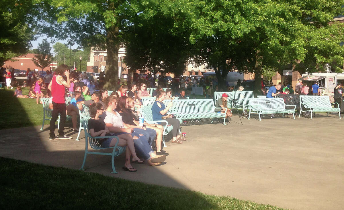 A crowd gathers at Tuesday's Ice Cream Social at Edwardsville City Park. The band stand hosted a live performance by Anaheim with A440.