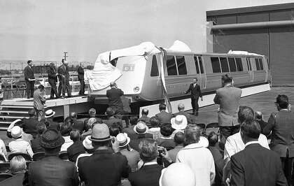 Bay Area Rapid Transit officials unveil BART’s first model car, which toured around the Bay Area in 1965. Those railcars, with their classic slanted nose design, are being phased out.