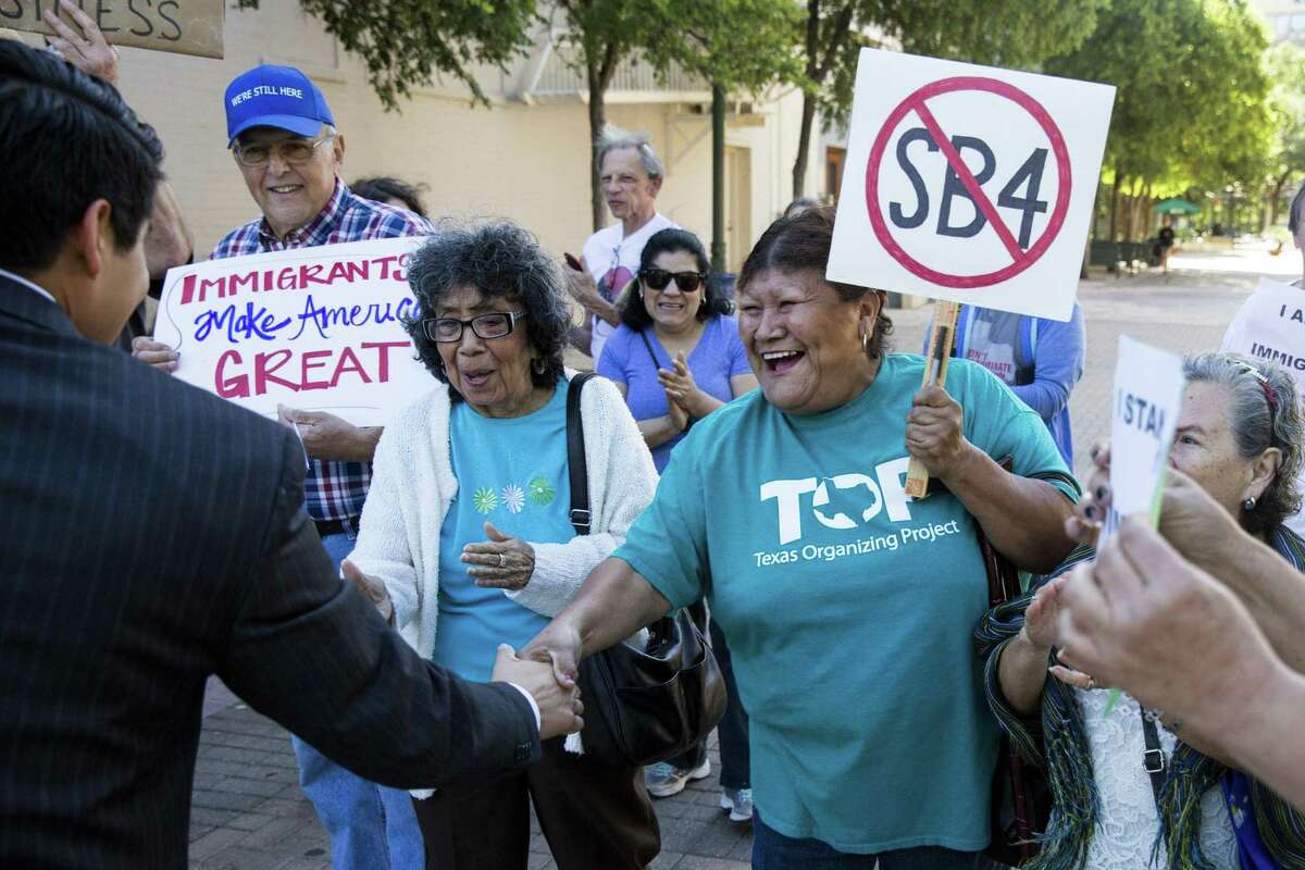 Councilman Rey Salda?–a meets with people demonstrating to ask the city to file a lawsuit against S.B. 4 at the Municipal Plaza building in San Antonio, Texas on May 25, 2017. Ray Whitehouse / for the San Antonio Express-News