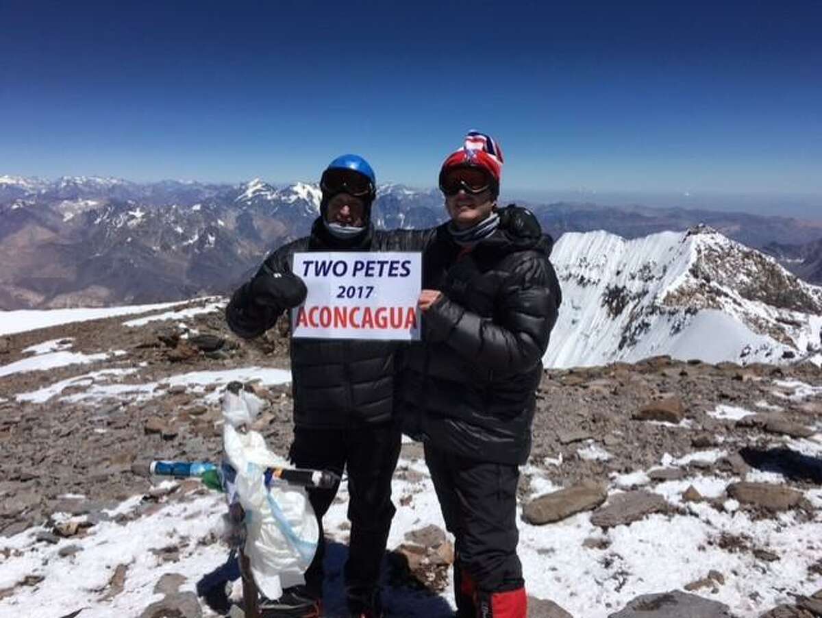 Peter McDonough and his son, Pete, at the Aconcagua Summit in South America.